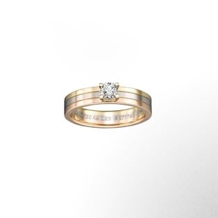Trinity 單鑽戒指 卡地亞婚戒象徵著二人世界的幸福美滿，它沿襲了最為經典的設計風格，由品牌旗下的珠寶大師一手打造而成。